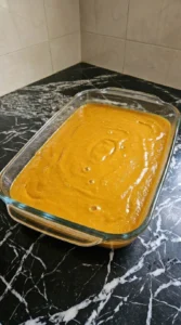 Dump Cake Pumpkin Fall Desserts pumpkin custard poured evenly into a 9x13 baking dish Recipe focus: dump cake recipes pumpkin fall desserts.