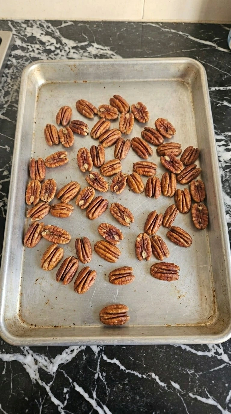 Fall Apple Salad pecans toasted deep golden in a rimmed baking tray Recipe focus: fall salads recipes autumn.