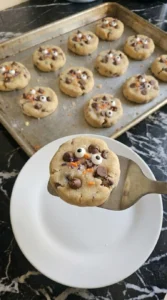 Halloween Chocolate Chip Cookies Pillsbury cooled and casually arranged on a white serving plate