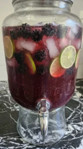 Halloween Cocktails for a Crowd finished with ginger beer bubbles, whole blackberries and Persian lime Recipe focus: easy halloween cocktails for a crowd.