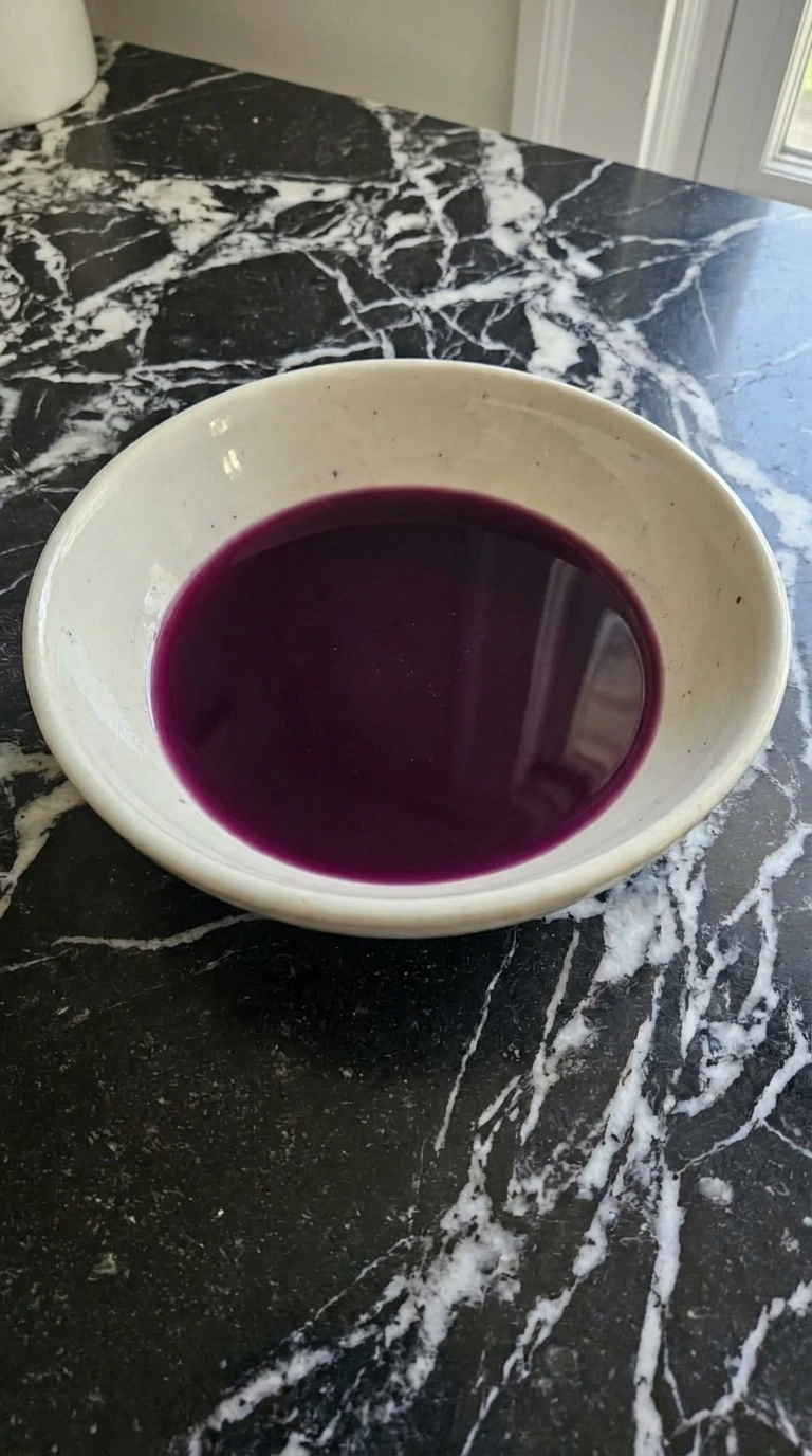 Halloween Cocktails step with smooth seedless deep violet blackberry syrup chilled in a shallow bowl Recipe focus: halloween easy cocktails.