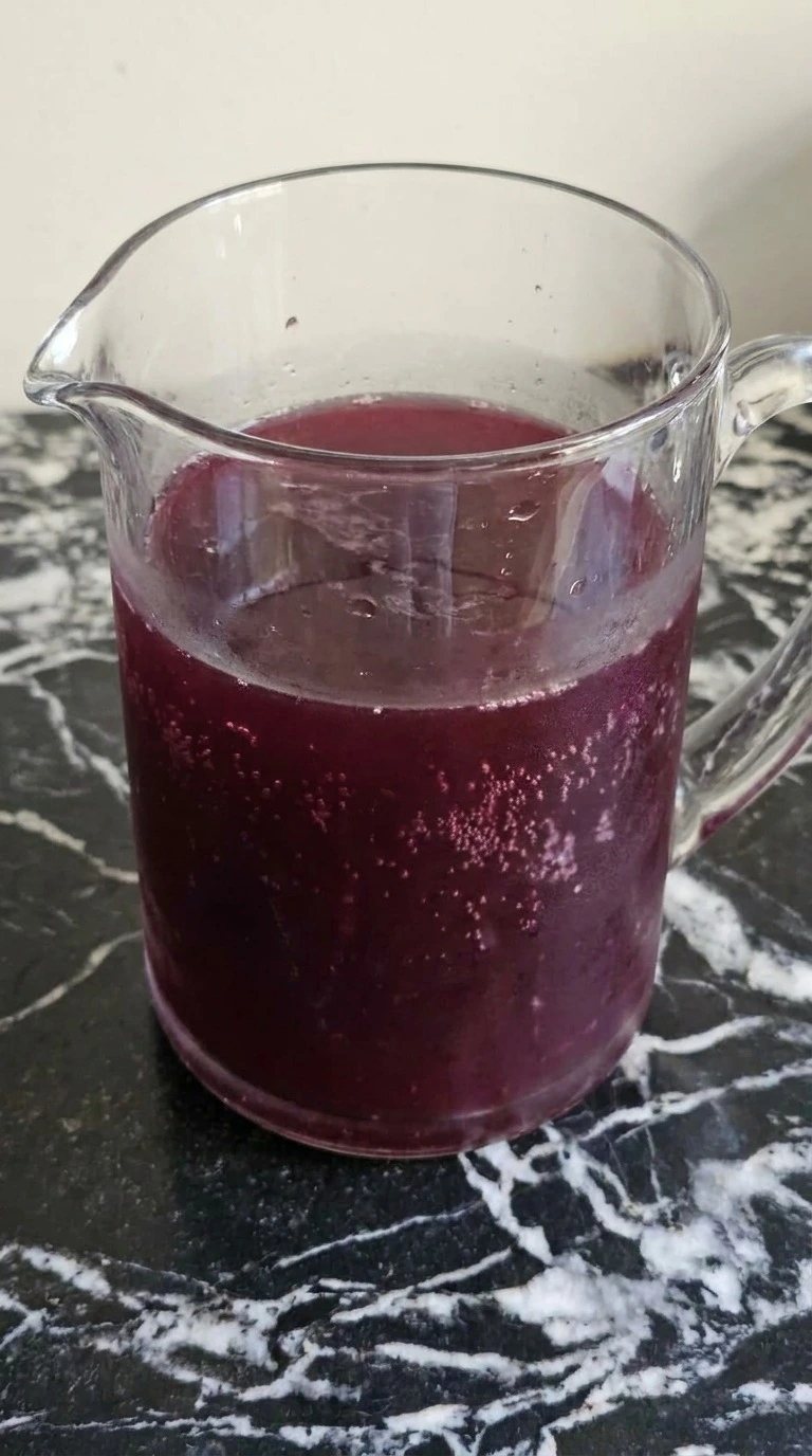 Halloween Cocktails step with deep garnet-purple shaken gin, pomegranate, lime, Cointreau and blackberry base Recipe focus: halloween cocktails easy recipe.