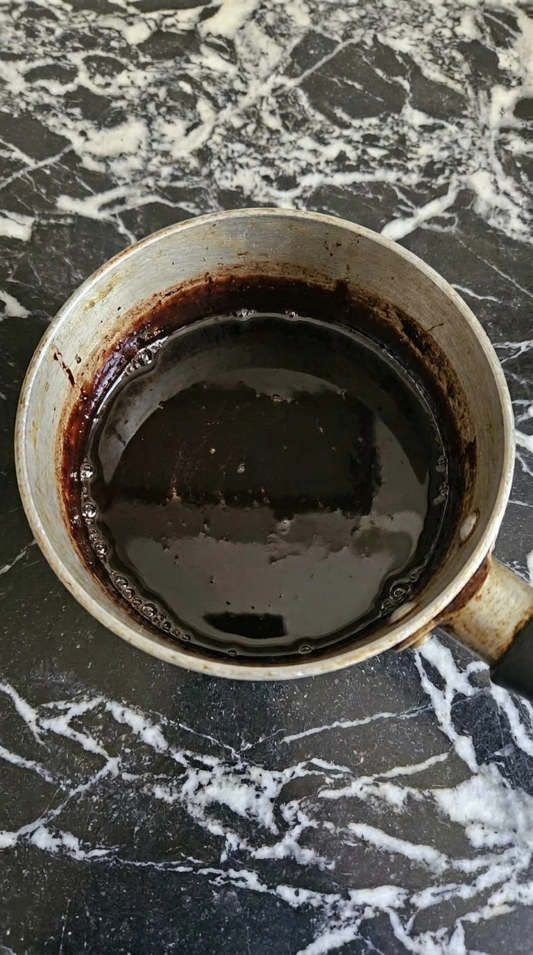 Halloween Coffee Bar black cocoa mocha syrup cooked until glossy with tiny edge bubbles Recipe focus: halloween coffee drinks.