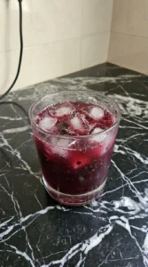 Halloween Drinks Alcohol Cocktails step showing deep ruby vodka berry mixture shaken with ice Recipe focus: halloween drinks alcohol cocktails easy.