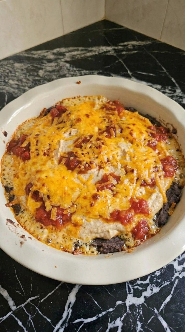 Halloween Food for Party Appetizers Dip baked with bubbling edges and deep golden melted cheddar Recipe focus: potluck halloween dishes.