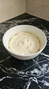 Halloween Fruit Pizza cream cheese frosting whipped until thick, pale and satiny Recipe focus: halloween dinner ideas for kids.