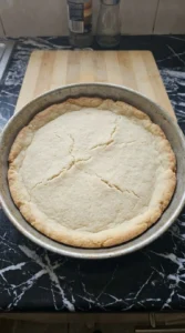 Halloween Fruit Pizza Sugar Cookie crust baked with a pale center and lightly golden uneven edges