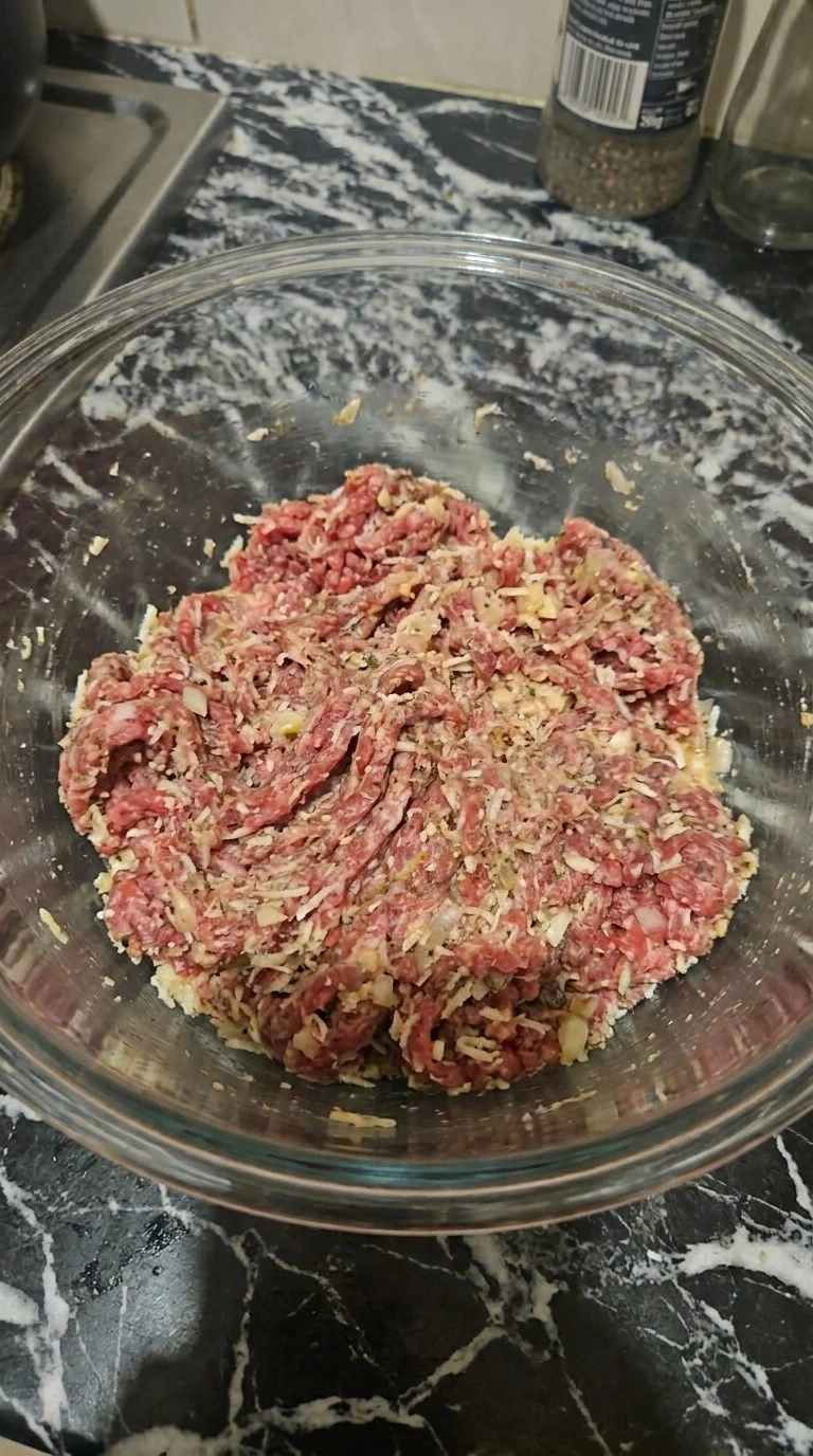 Halloween Party Food Meatballs beef mixture folded with panko, milk, onion, garlic and seasonings