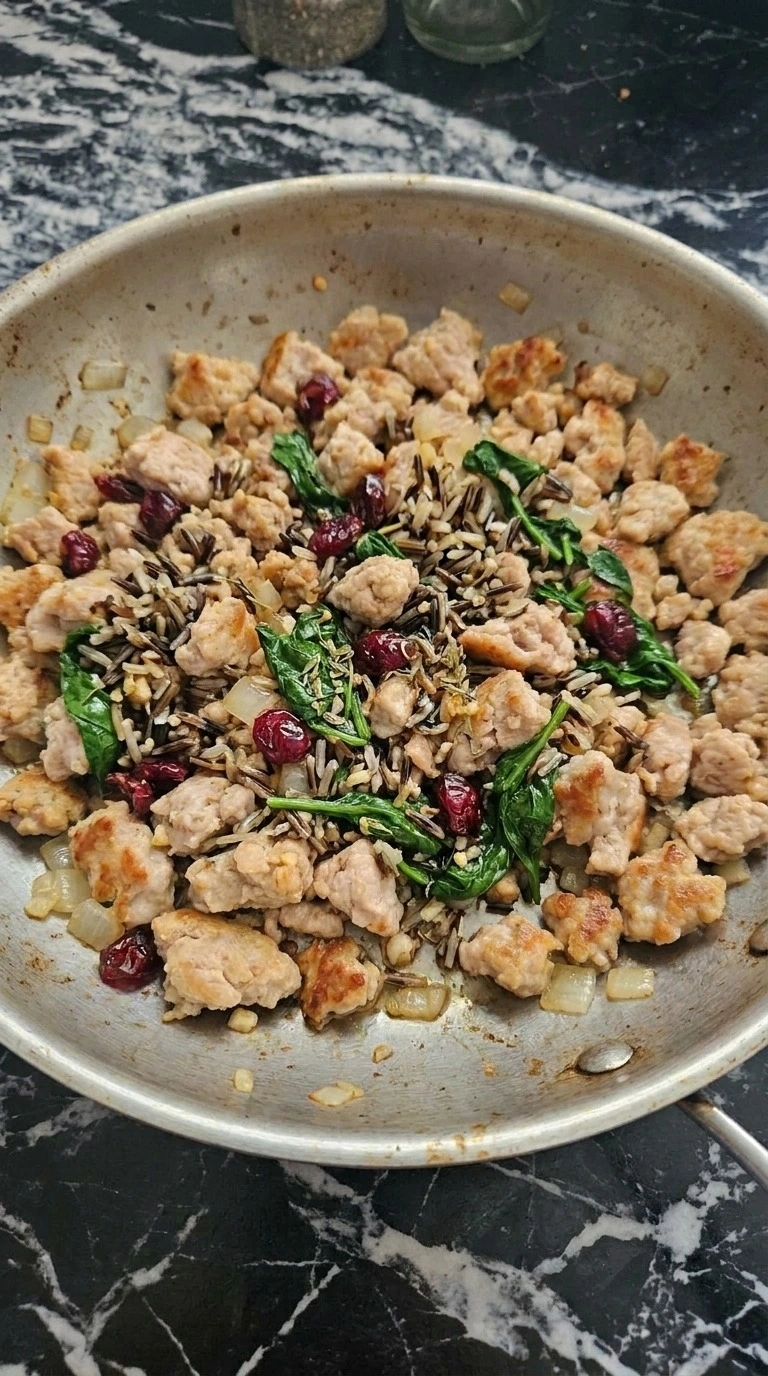 Halloween Pumpkin Carving filling with turkey, wild rice, wilted spinach and glossy dried cranberries. Recipe focus: easy halloween pumpkin carving.