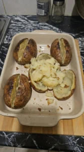 Loaded Baked Potato Soup baked russet potatoes being prepared Recipe focus: potato bacon soup.
