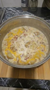 Loaded Baked Potato Soup with melted cheddar and bacon mixed in Recipe focus: loaded potato soup.