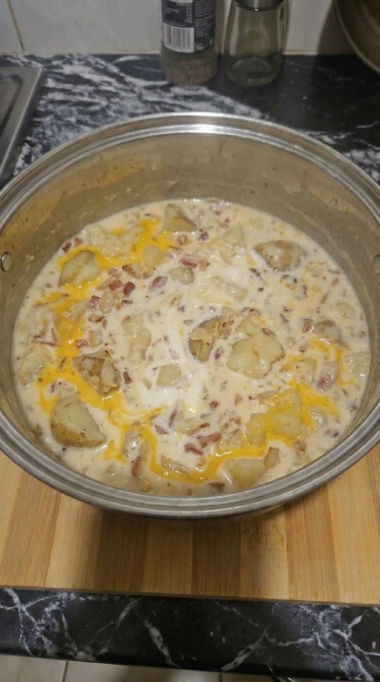 Loaded Baked Potato Soup with melted cheddar and bacon mixed in Recipe focus: loaded potato soup.