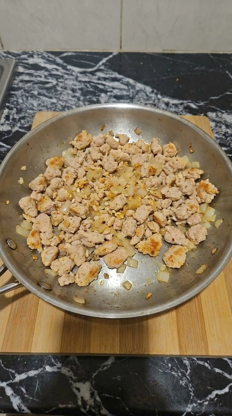 Orange Halloween Party Food step with browned lean turkey, onion, garlic and toasted spices