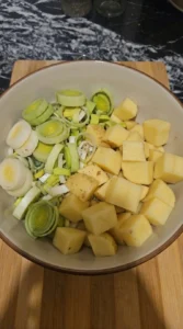 Potato Leek Soup step 1 with sliced leeks and cubed potatoes Recipe focus: potato leek soup recipe.