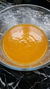 Pumpkin Bread with Chocolate Chips wet mixture whisked smooth and glossy orange Recipe focus: best pumpkin bread recipe.