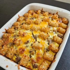 Tater Tot Breakfast Casserole with golden tater tots and melted cheese Recipe focus: breakfast casserole with hashbrowns.