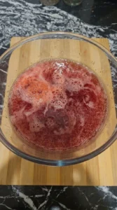 Christmas Sherbet Punch with sparkling soda blended into fruit juice Recipe focus: christmas punch with sherbet.