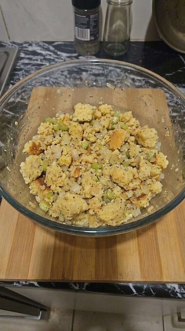 Cornbread Dressing mixture with moist cornbread pieces, softened vegetables and savory broth Recipe focus: easy cornbread dressing.