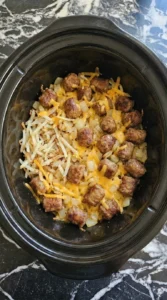 Crockpot Breakfast Casserole layers of hashbrowns sausage cheese and eggs Recipe focus: breakfast casserole with hashbrowns.