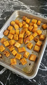 Fall Pasta Salad squash roasting with golden vegetable cubes Recipe focus: vegan fall pasta salad.