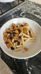 Fall Pasta Salad plated serving with penne squash and pecans Recipe focus: fall pasta salad recipes.