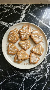 Gluten Free Gingerbread Cookies decorated with simple icing details Recipe focus: gluten free dairy free gingerbread cookies.