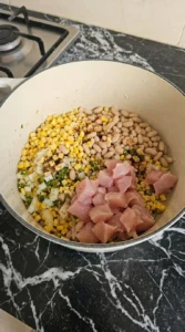 Mexican Street Corn White Chicken Chili chicken and corn mixture before simmering Recipe focus: creamy white chicken chili.