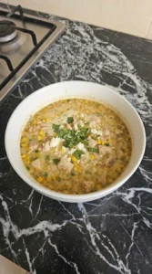 Mexican Street Corn White Chicken Chili served portion with chicken corn and toppings Recipe focus: easy white chicken chili.