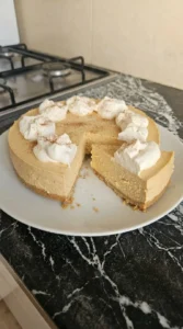 No Bake Pumpkin Cheesecake chilled until firm with a clean slice revealing creamy pumpkin layers Recipe focus: pumpkin pie cheesecake.