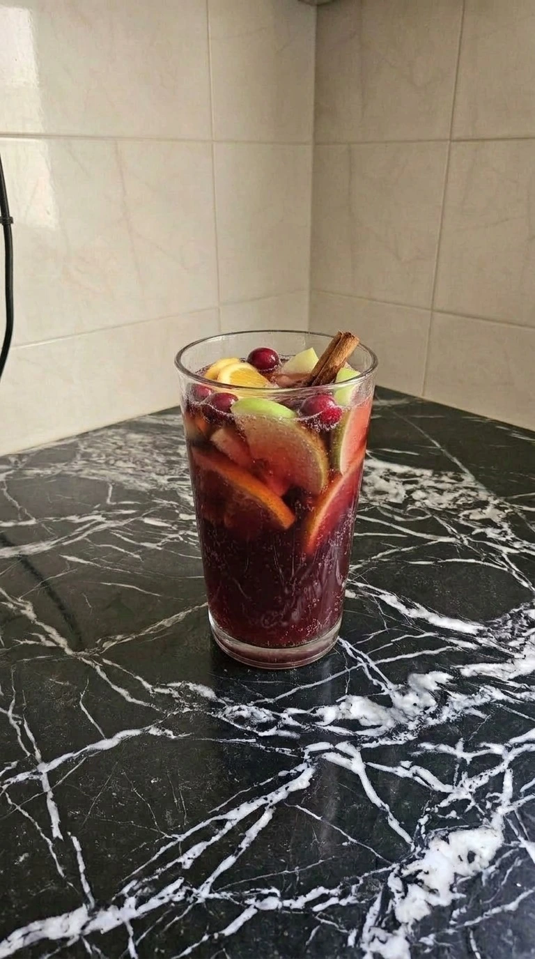 Non Alcoholic Christmas Punch served glass with fruit garnish Recipe focus: easy christmas punch non alcoholic.